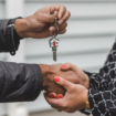 Realtor Handing Over Keys