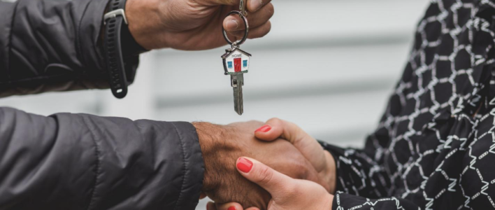 Realtor Handing Over Keys