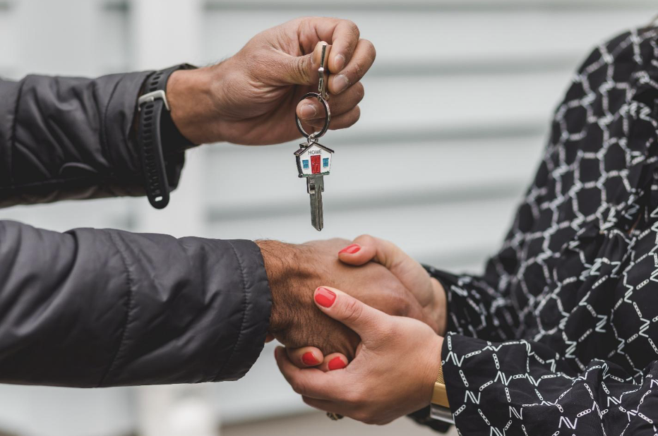 Realtor Handing Over Keys